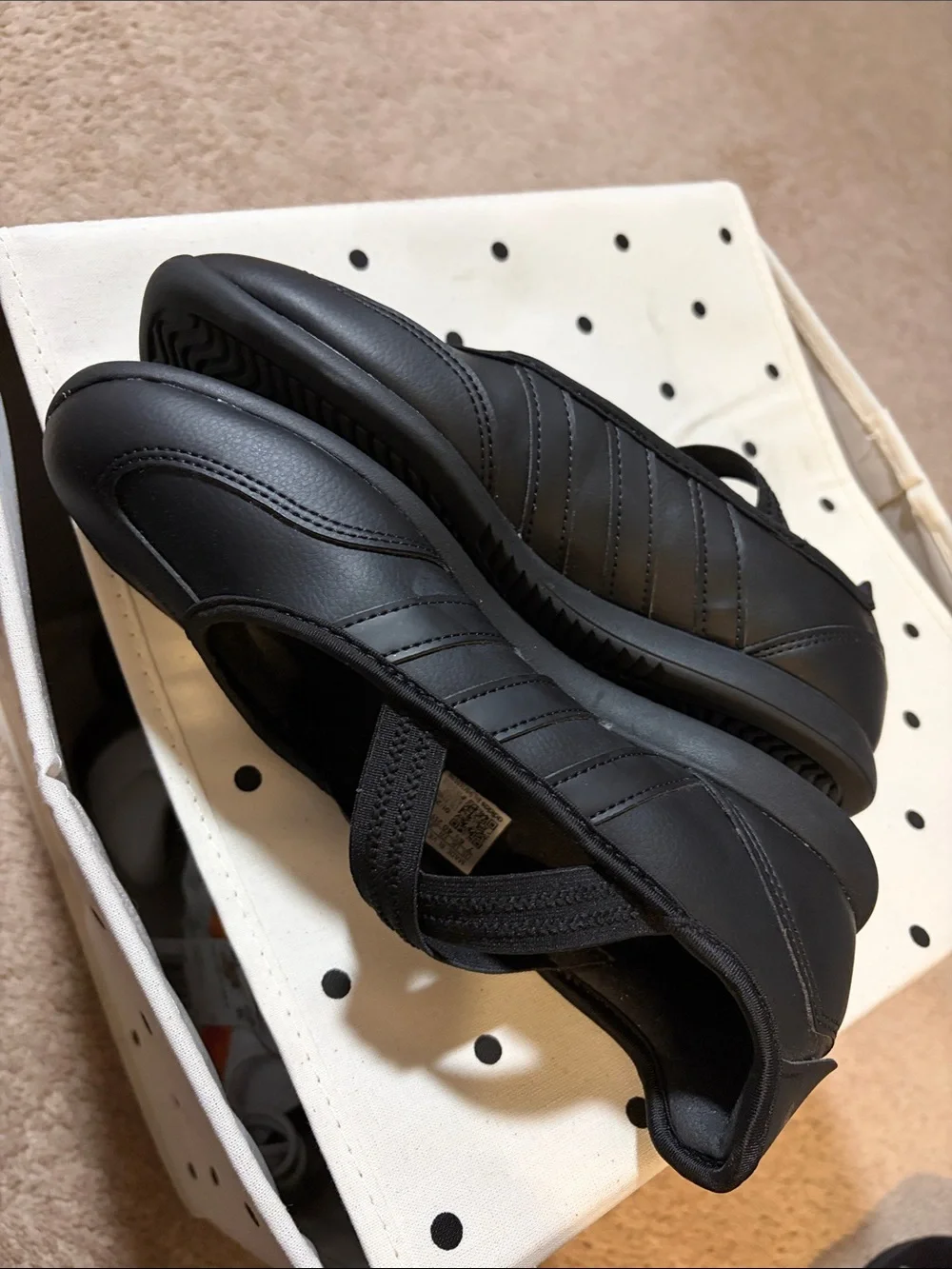 adidas Women's/youth Black Slip-On Athletic Flats with Elastic Cross Straps.